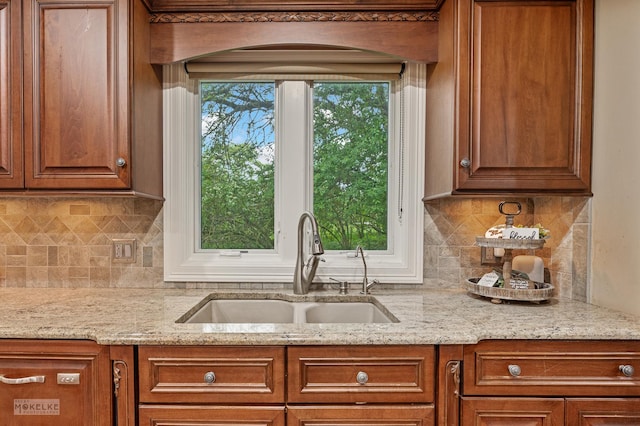 7S745 State Route 53rd Hwy, Naperville, IL 60540 - kitchen with a sink, brown cabinetry, and backsplash