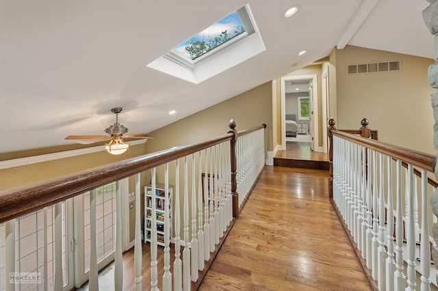 7S745 State Route 53rd Hwy, Naperville, IL 60540 - hallway with a skylight, light wood-type flooring, vaulted ceiling, and recessed lighting