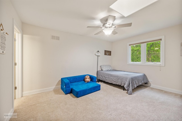 7S745 State Route 53rd Hwy, Naperville, IL 60540 - bedroom with carpet floors, a skylight, baseboards, and a ceiling fan