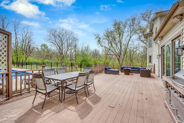 7S745 State Route 53rd Hwy, Naperville, IL 60540 - deck featuring an outdoor living space, outdoor dining space, and view of wooded area