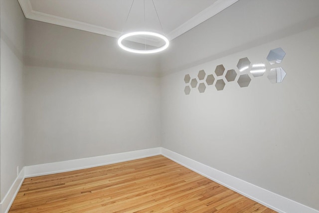 5415 S Dorchester Ave Unit 2B, Chicago, IL 60615 - spare room featuring ornamental molding, light wood-style flooring, and baseboards