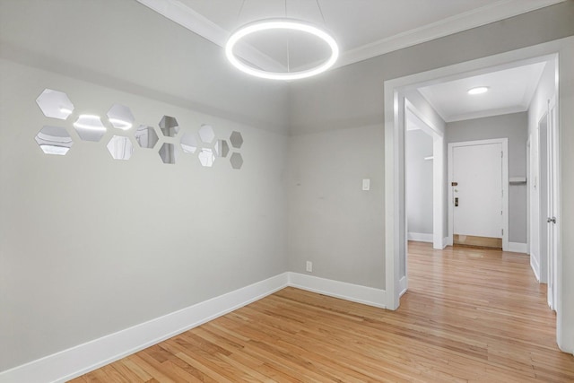 5415 S Dorchester Ave Unit 2B, Chicago, IL 60615 - spare room with ornamental molding, light wood-type flooring, and baseboards