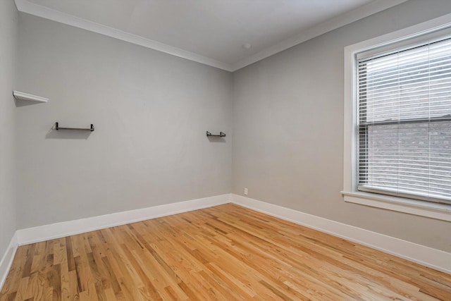 5415 S Dorchester Ave Unit 2B, Chicago, IL 60615 - empty room with light wood-style floors, baseboards, and crown molding