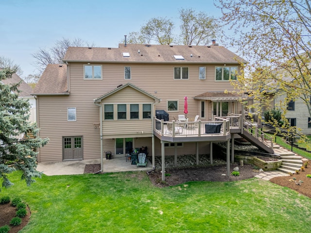 back of house with a patio, a lawn, a pergola, and a deck