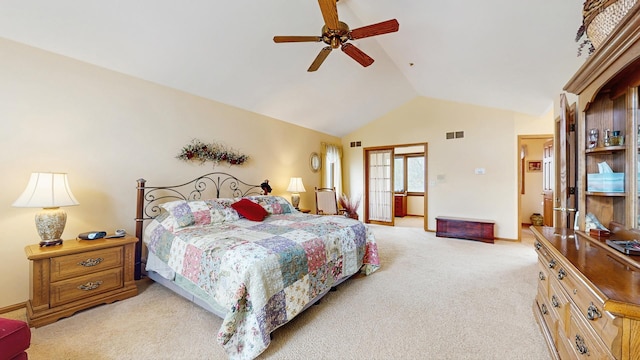 bedroom featuring visible vents, a ceiling fan, high vaulted ceiling, and light carpet