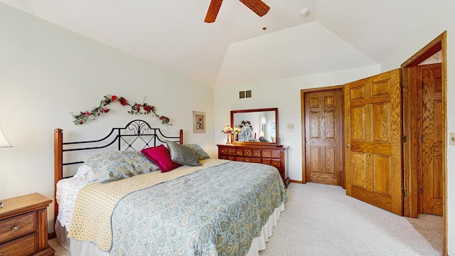 bedroom with ceiling fan, light colored carpet, baseboards, lofted ceiling, and visible vents