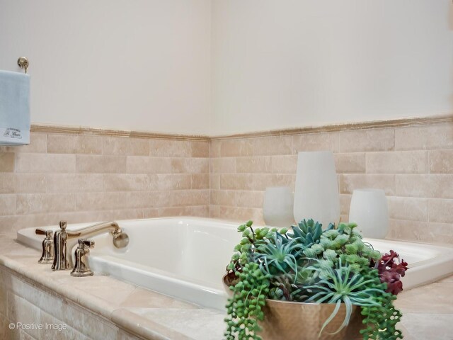 1033 Hickory Dr, Western Springs, IL 60558 - full bathroom featuring crown molding, a shower stall, a tub with jets, and a notable chandelier