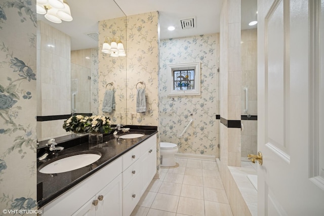2365 Waukegan Rd Unit 2C, Northbrook, IL 60062 - full bathroom with tile patterned floors, a stall shower, toilet, and a sink