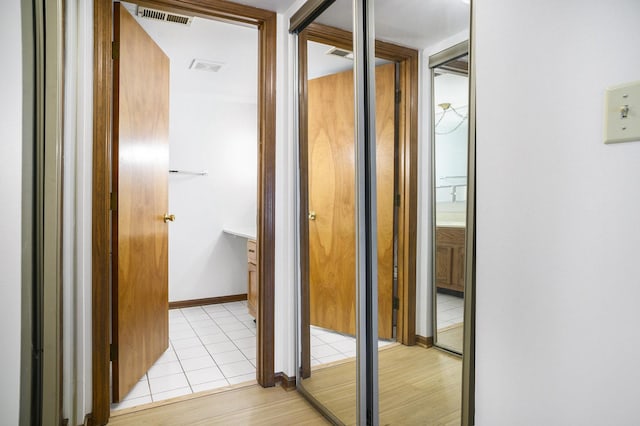 2608 186th St Unit 105, Lansing, IL 60438 - hallway with visible vents and light tile patterned flooring