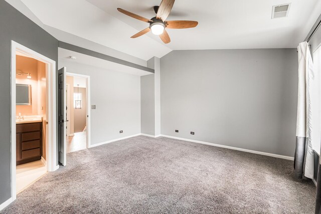 1106 Andover Ct, Glendale Heights, IL 60139 - unfurnished bedroom featuring light carpet, lofted ceiling, baseboards, ceiling fan, and ensuite bathroom
