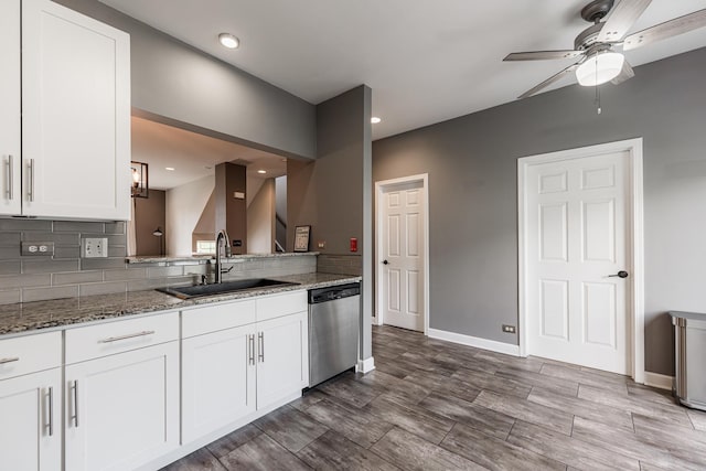 1106 Andover Ct, Glendale Heights, IL 60139 - kitchen featuring stainless steel dishwasher, a sink, tasteful backsplash, light stone counters, and ceiling fan