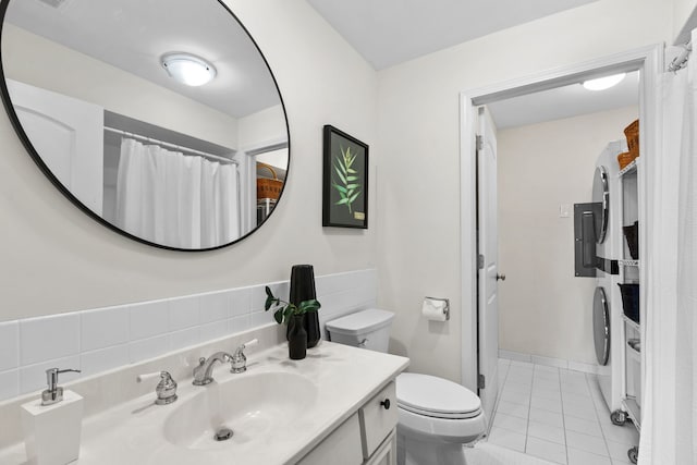 full bathroom featuring vanity, toilet, tile patterned flooring, and a shower with shower curtain
