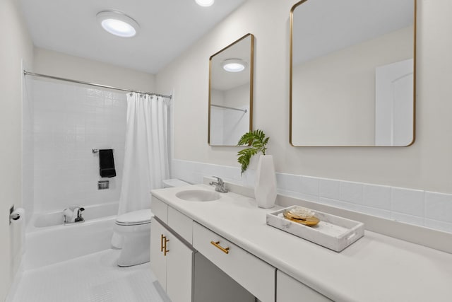 full bath featuring shower / bath combination with curtain, tile patterned floors, vanity, and toilet