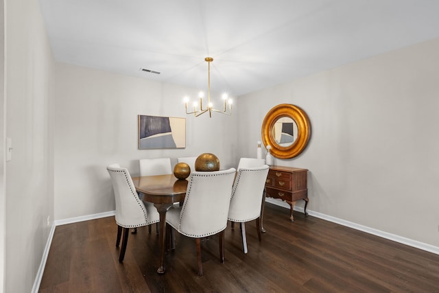 dining space with a chandelier, baseboards, visible vents, and dark wood-style floors