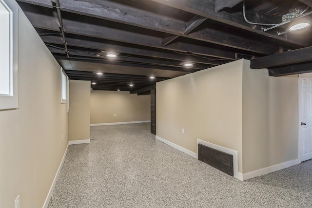 basement featuring baseboards
