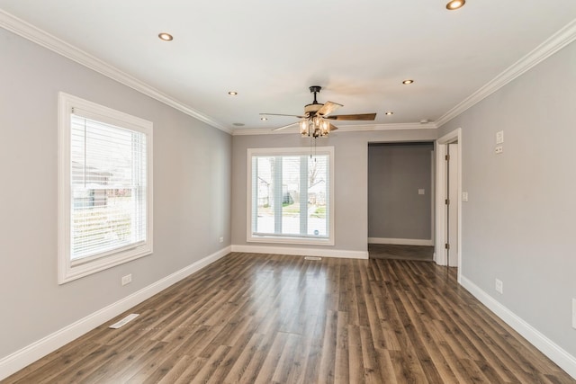 unfurnished room with wood walls, recessed lighting, dark wood finished floors, and baseboards