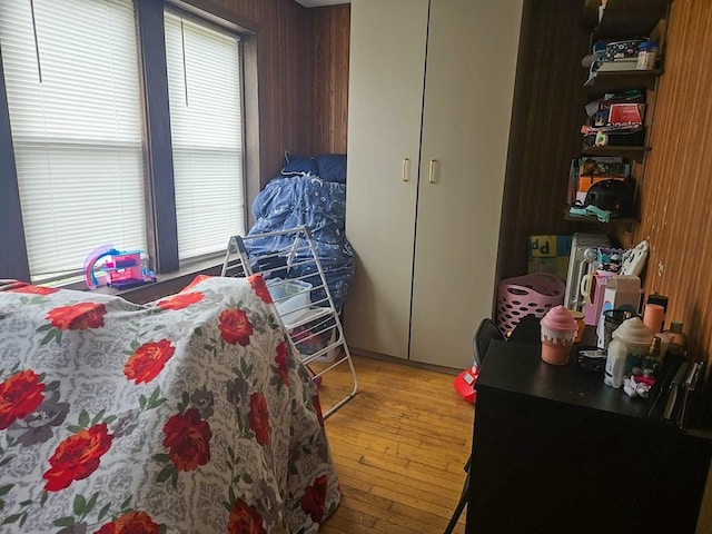 bedroom with light wood-style floors