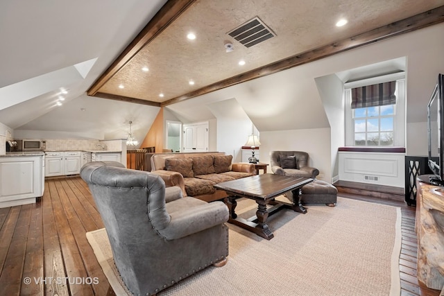 546 Oak Knoll Rd, Barrington Hills, IL 60010 - living room with lofted ceiling with beams, recessed lighting, visible vents, and hardwood / wood-style flooring