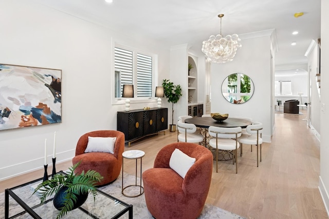 3452 N Bell Ave, Chicago, IL 60618 - dining room with light wood-style flooring, a chandelier, recessed lighting, and built in features