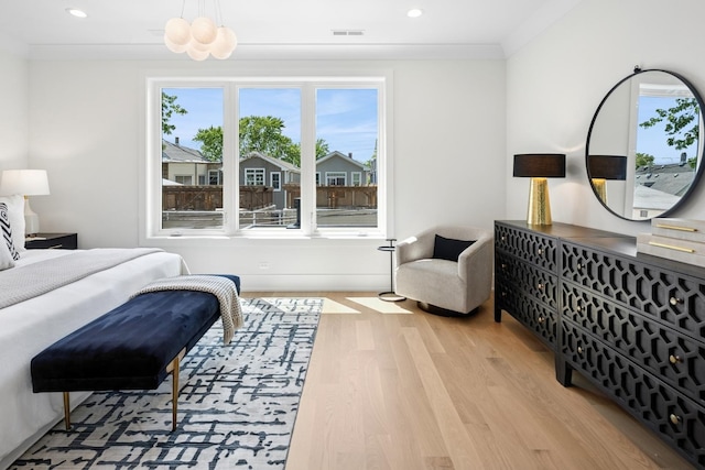 3452 N Bell Ave, Chicago, IL 60618 - bedroom featuring wood finished floors and recessed lighting
