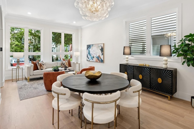 3452 N Bell Ave, Chicago, IL 60618 - dining area featuring a chandelier, light wood finished floors, and recessed lighting