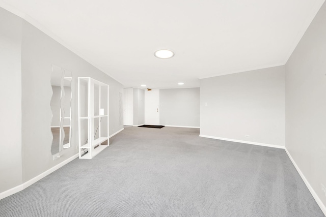 spare room with recessed lighting, carpet floors, and baseboards