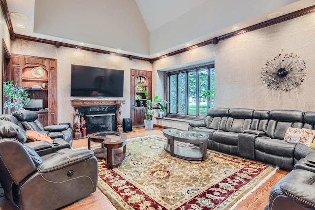 37418 N Fox Hill Dr, Wadsworth, IL 60083 - living room featuring high vaulted ceiling, a high end fireplace, wood finished floors, and recessed lighting