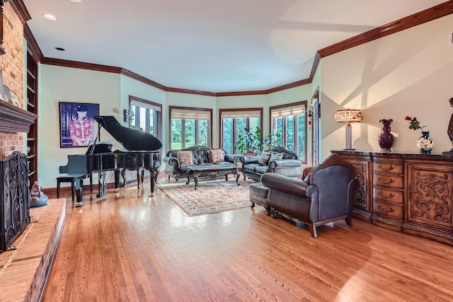 37418 N Fox Hill Dr, Wadsworth, IL 60083 - living area featuring baseboards, crown molding, a brick fireplace, and wood finished floors