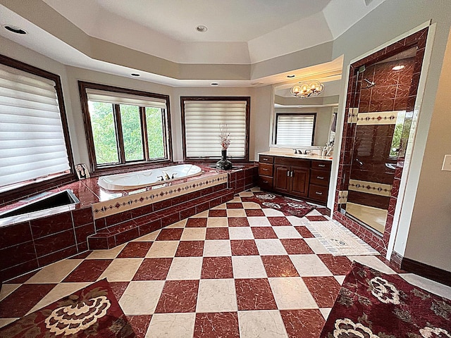 37418 N Fox Hill Dr, Wadsworth, IL 60083 - bathroom featuring a stall shower, a chandelier, a garden tub, vanity, and a raised ceiling