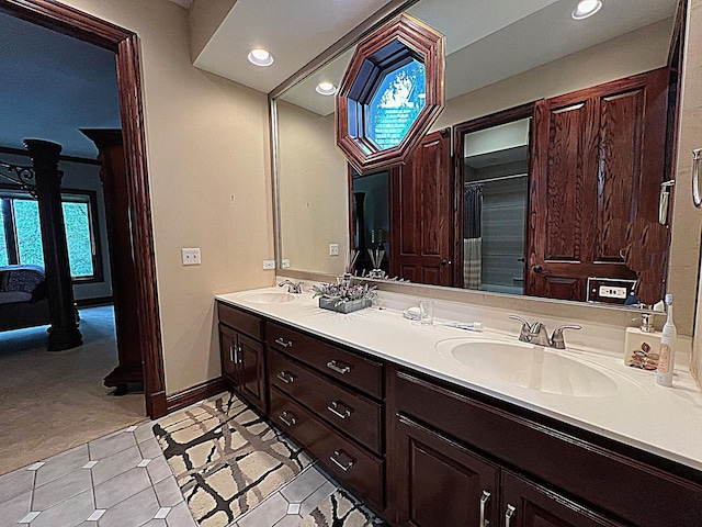 37418 N Fox Hill Dr, Wadsworth, IL 60083 - bathroom with recessed lighting, double vanity, tile patterned flooring, and a sink