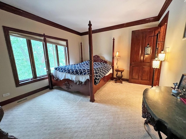 37418 N Fox Hill Dr, Wadsworth, IL 60083 - bedroom with baseboards, light carpet, visible vents, and ornamental molding