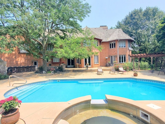 37418 N Fox Hill Dr, Wadsworth, IL 60083 - view of pool with a pergola, a patio area, and a pool with connected hot tub
