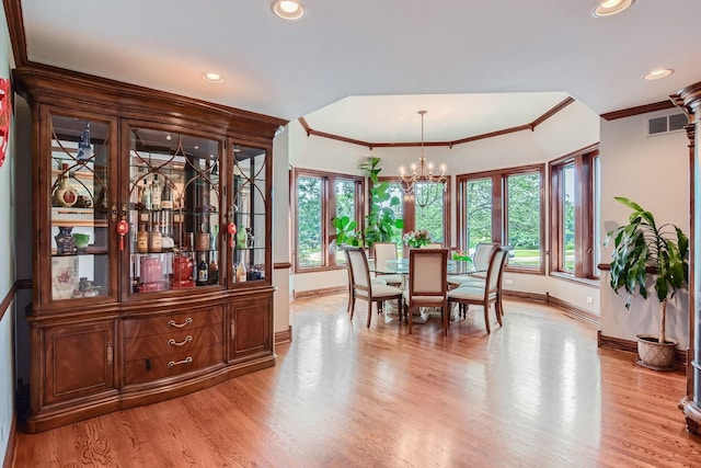 37418 N Fox Hill Dr, Wadsworth, IL 60083 - dining area with baseboards, an inviting chandelier, light wood-style floors, and crown molding