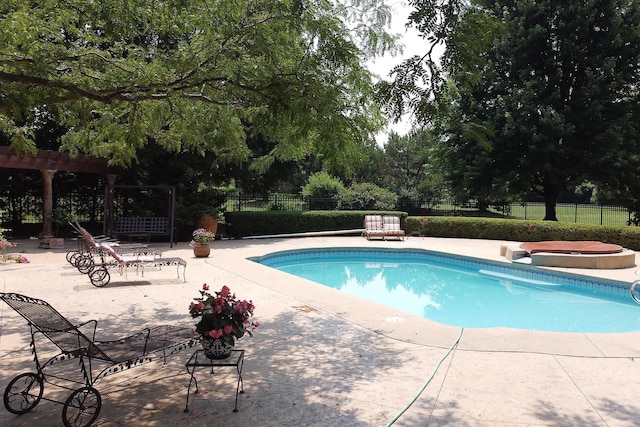 37418 N Fox Hill Dr, Wadsworth, IL 60083 - view of swimming pool featuring a jacuzzi, a pergola, a patio area, fence, and a fenced in pool