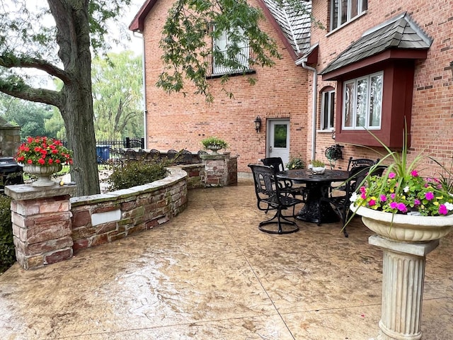 37418 N Fox Hill Dr, Wadsworth, IL 60083 - view of patio with outdoor dining space and fence