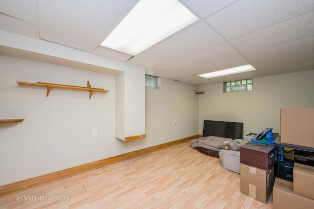1216 Maple St, Lake In The Hills, IL 60156 - basement featuring wood finished floors, a paneled ceiling, and baseboards