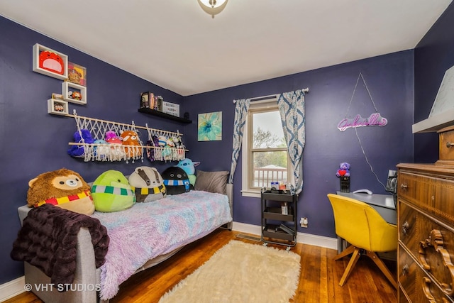 1216 Maple St, Lake In The Hills, IL 60156 - bedroom featuring wood finished floors and baseboards