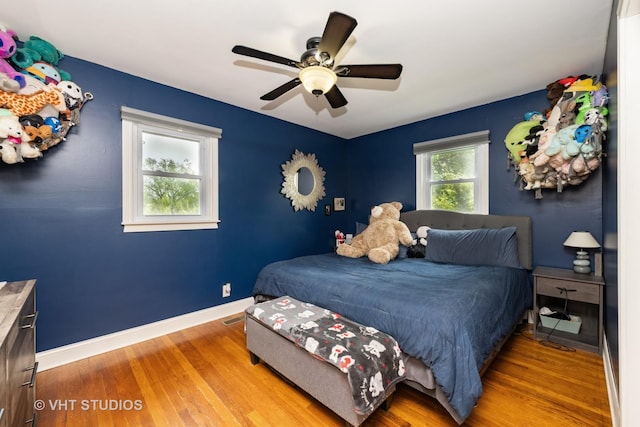 1216 Maple St, Lake In The Hills, IL 60156 - bedroom featuring wood finished floors, baseboards, and ceiling fan