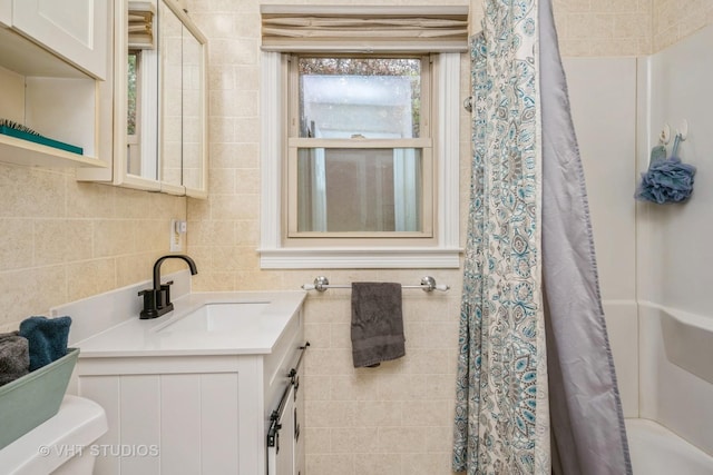 1216 Maple St, Lake In The Hills, IL 60156 - bathroom with tile walls, toilet, curtained shower, and vanity