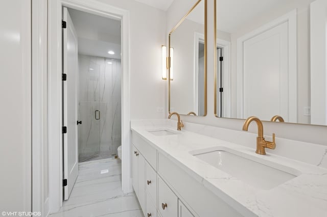 full bath featuring marble finish floor, toilet, a sink, and a marble finish shower