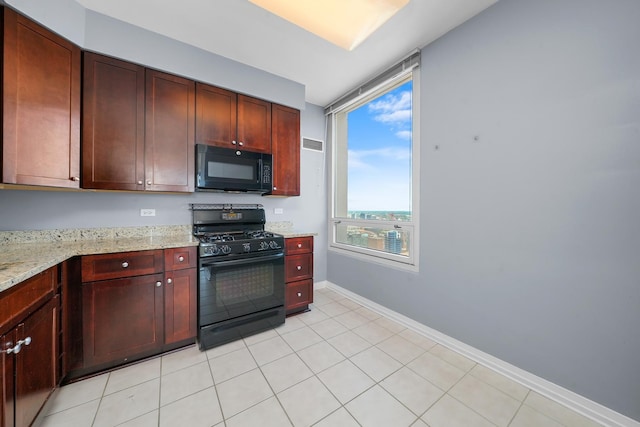 33 W Ontario St Unit 46A, Chicago, IL 60654 - kitchen featuring dark brown cabinets, baseboards, visible vents, light stone counters, and black appliances