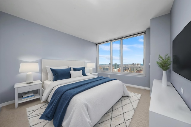 33 W Ontario St Unit 46A, Chicago, IL 60654 - bedroom featuring baseboards and light colored carpet