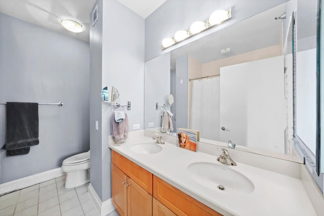 33 W Ontario St Unit 46A, Chicago, IL 60654 - full bath featuring tile patterned flooring, baseboards, a sink, and toilet