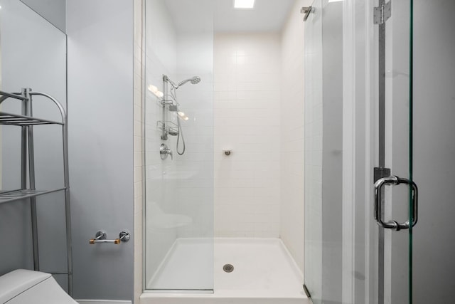 33 W Ontario St Unit 46A, Chicago, IL 60654 - bathroom featuring toilet and a stall shower