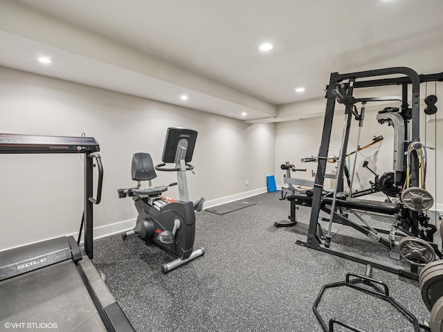 exercise area with recessed lighting and baseboards