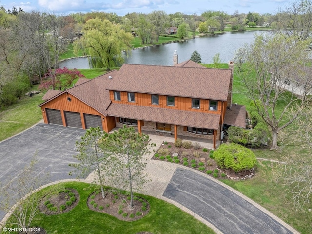drone / aerial view featuring a water view
