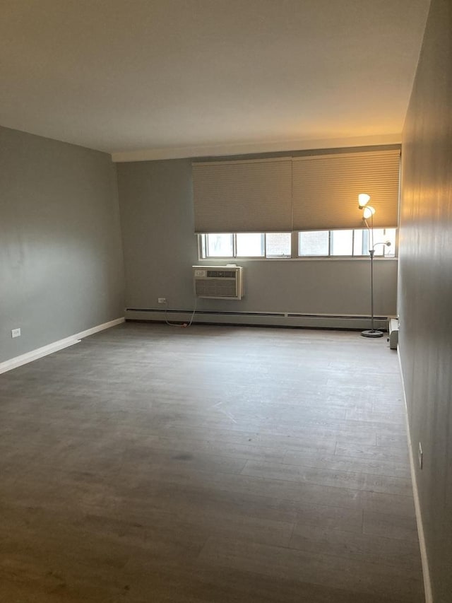 6300 N Sheridan Rd Unit 517, Chicago, IL 60660 - unfurnished room with a wall unit AC and baseboards