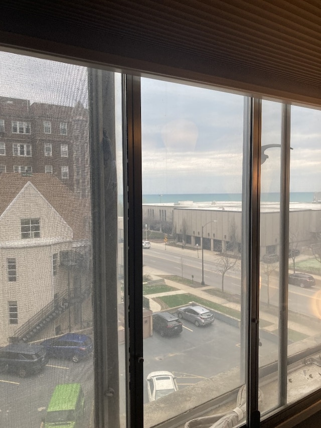 6300 N Sheridan Rd Unit 517, Chicago, IL 60660 - spare room with baseboards and dark wood-style flooring