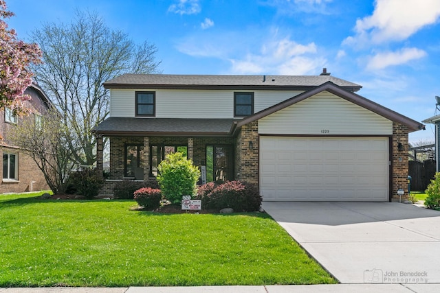 view of front of property with an attached garage, a front lawn, concrete driveway, brick siding, and roof with shingles