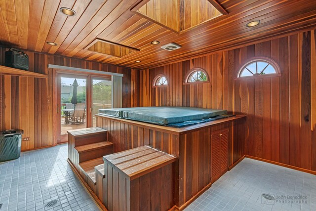 miscellaneous room featuring wood ceiling, wood walls, recessed lighting, and tile patterned floors